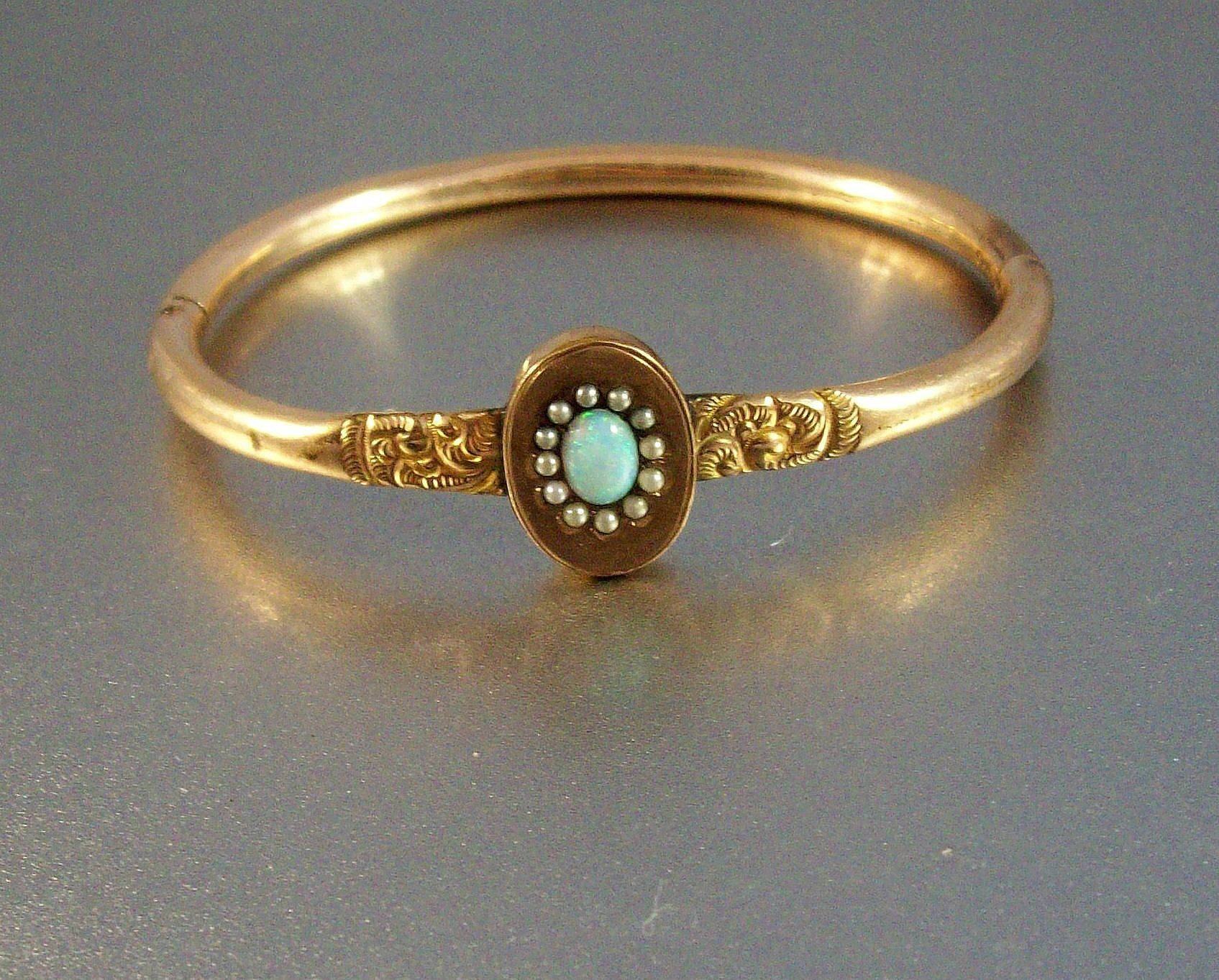 Victorian Gold Filled Fire Opal and Seed Pearl Bangle Bracelet.jpeg Victorian Gold Filled Fire Opal and Seed Pearl Bangle Bracelet.jpeg