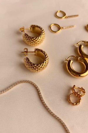 Gold hoop earrings by vie en bleu