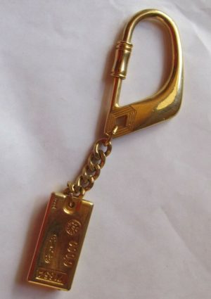 Rare Porte clef RENAULT lingot d'or 71854 doré.jpeg